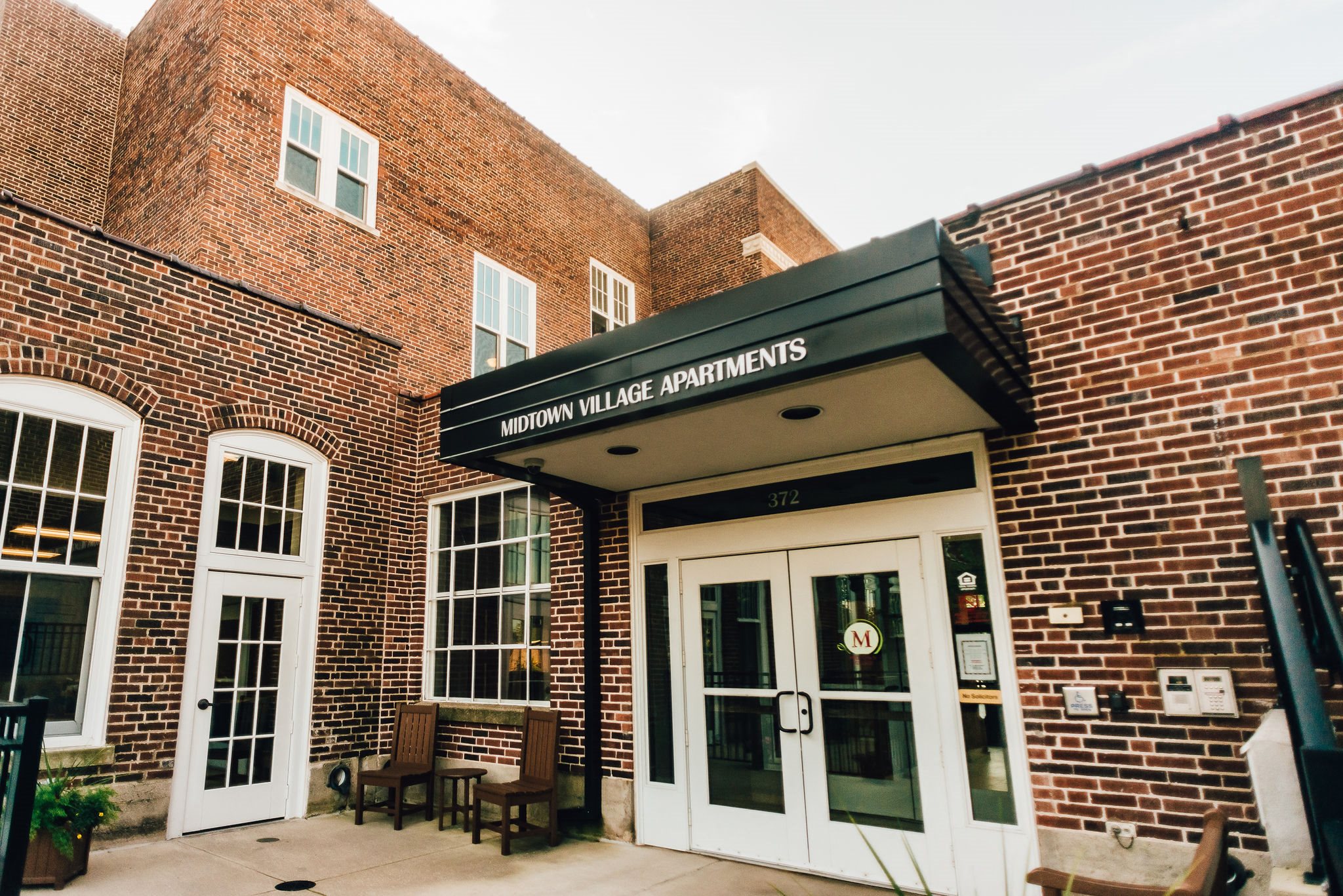front entrance to historic apartment building