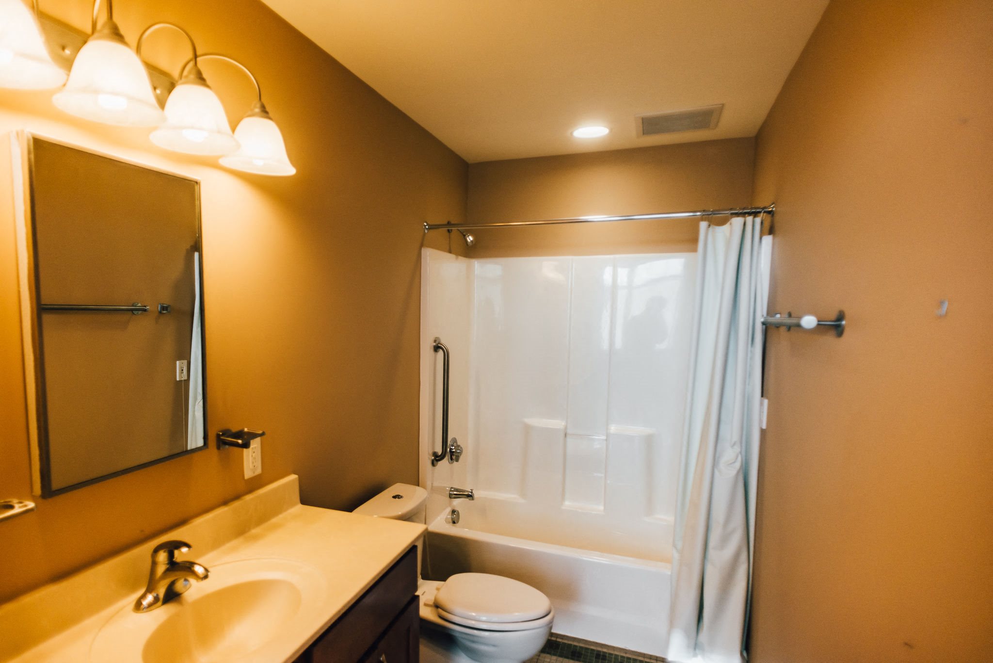 bathroom with beige walls