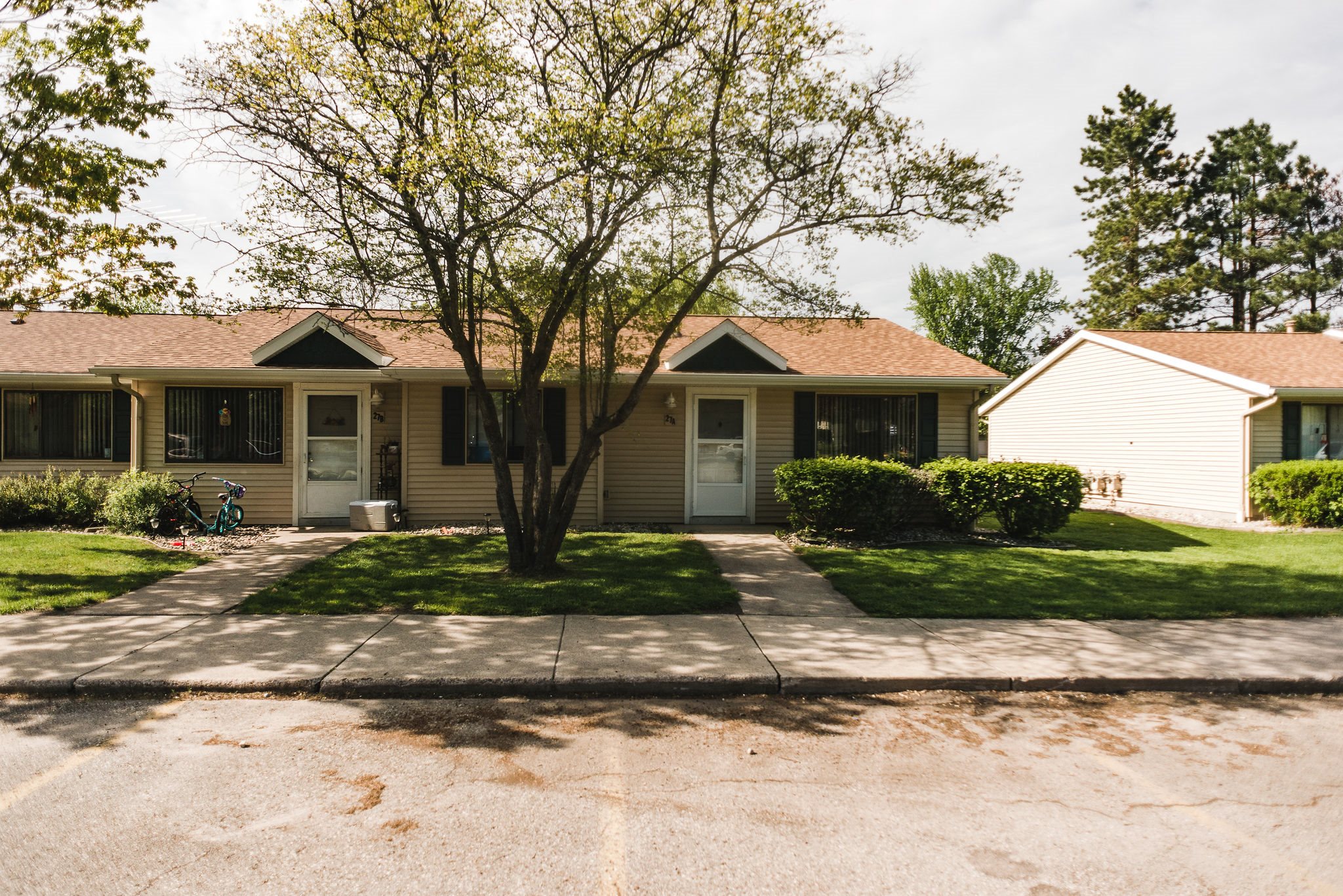 Grounds of apartment community with sidewalks