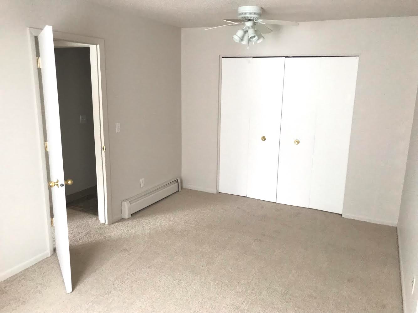 bedroom with double door closet