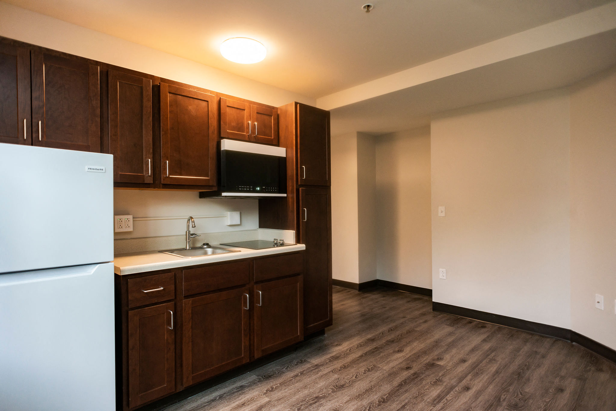 apartment kitchen with LVP flooring