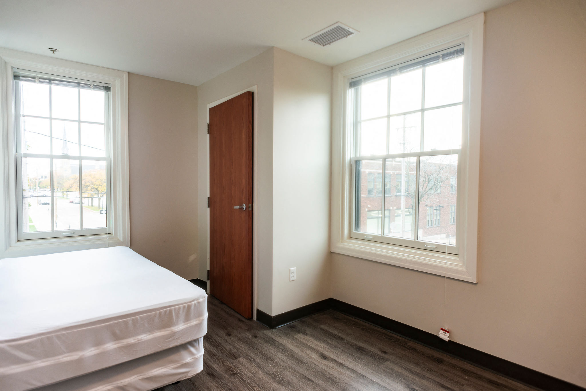 apartment bedroom with beige walls