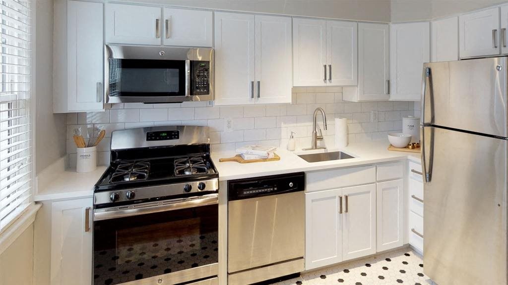 Tiled kitchens with sleek cabinetry at Alister Morristown, Morristown, NJ