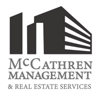 a logo for a company called mcfarer management and real estate services