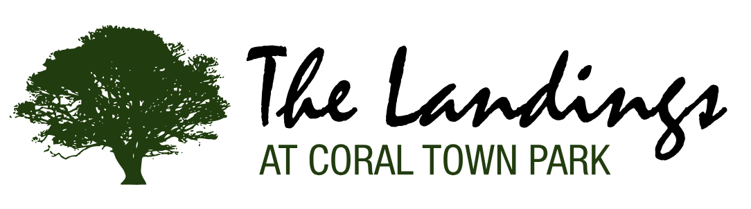A logo with a tree and the text "The Landings at Coral Town Park".