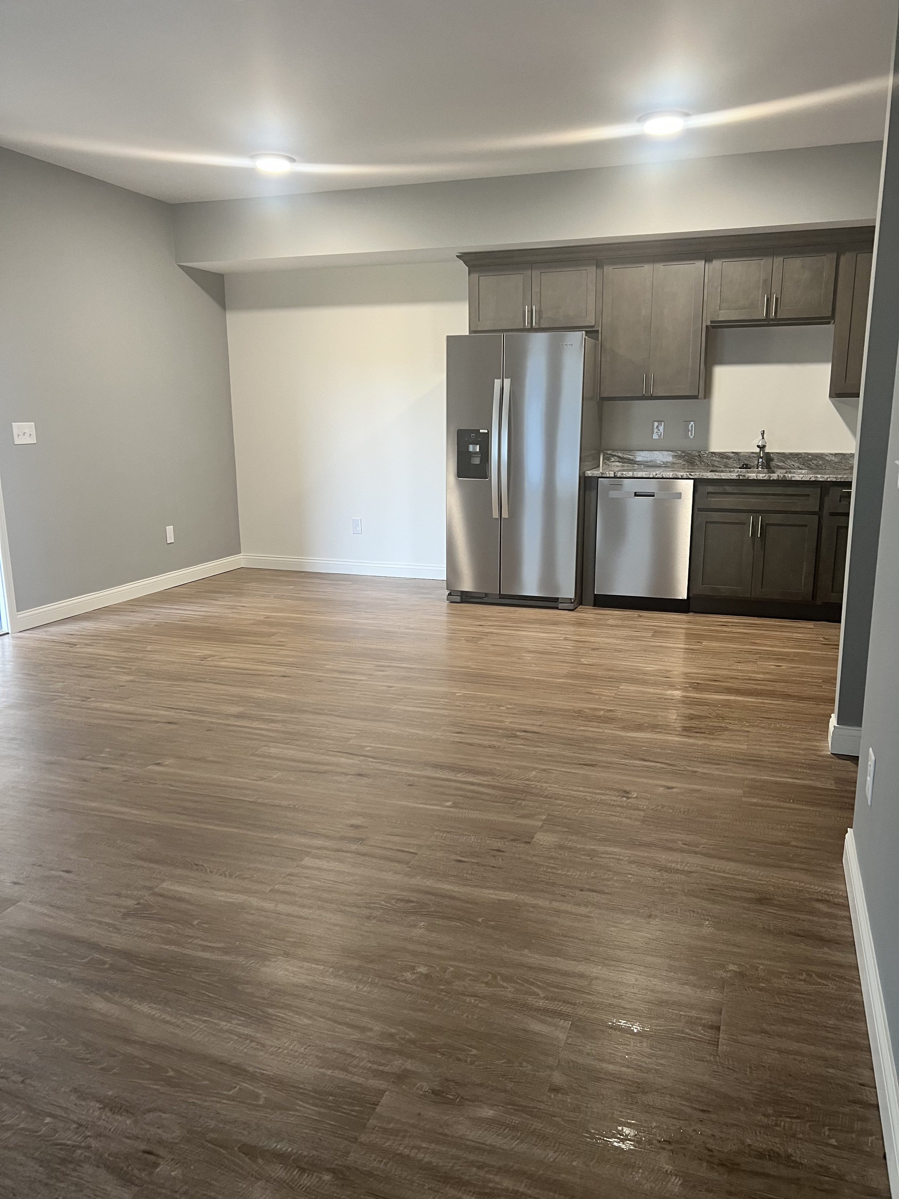 $1490 unit kitchen/dining area