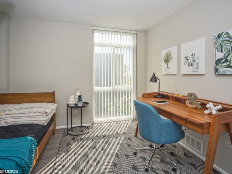 Bedroom with upgraded wood plank flooring