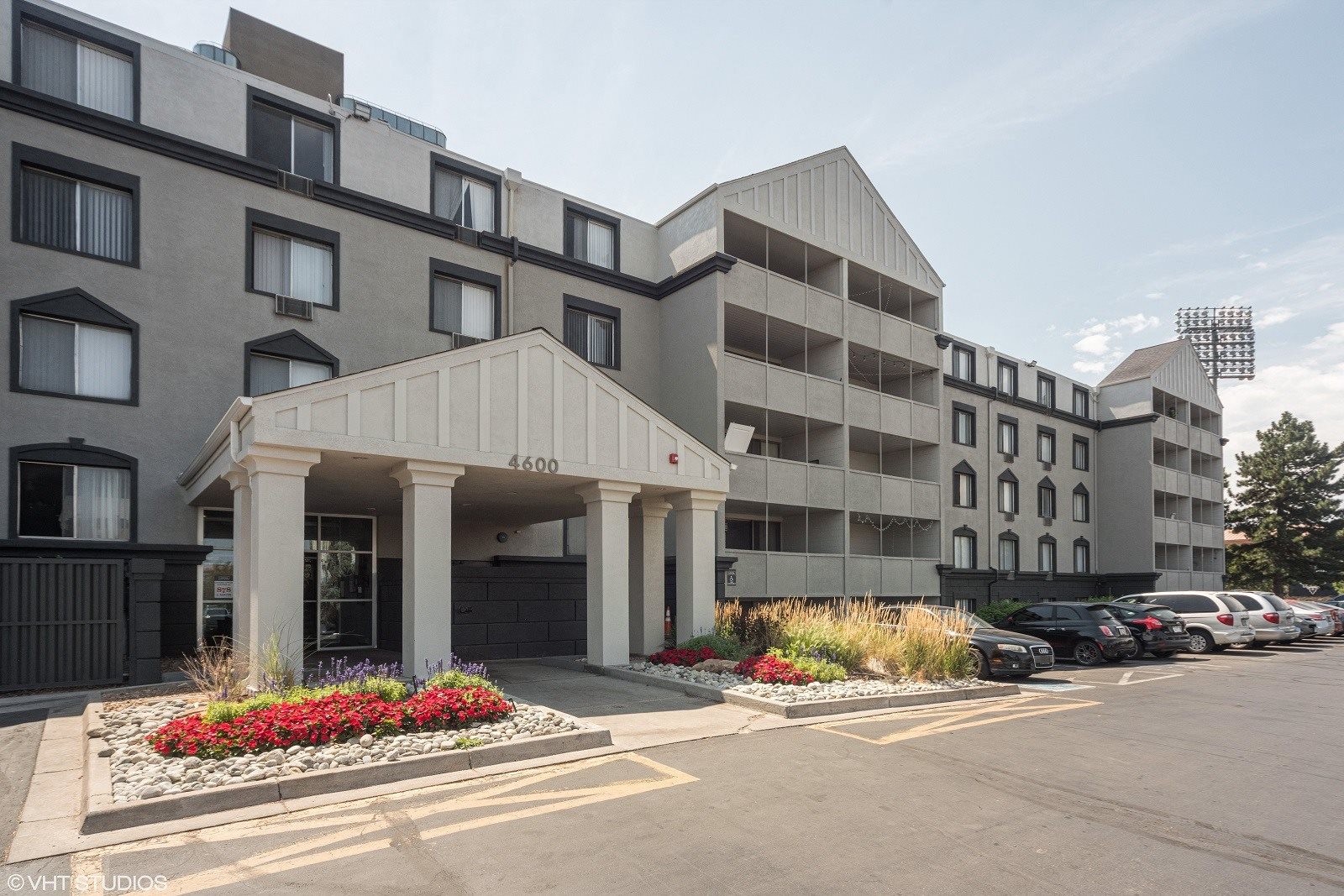 A large building with a parking lot in front of it at 4600 E Kentucky Ave in Denver, CO