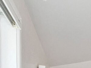 Bedroom with vaulted ceilings in the townhome.