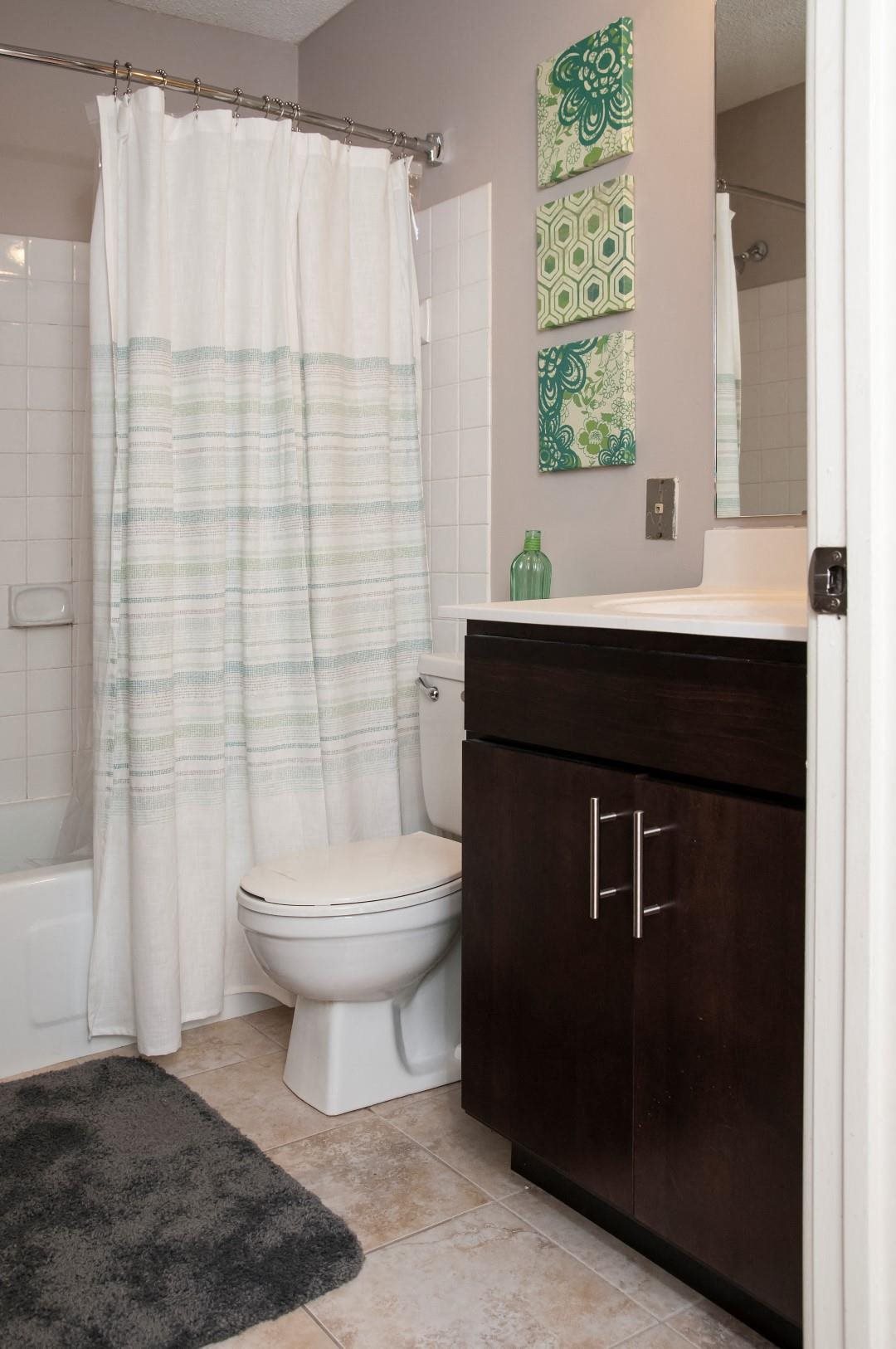 Bathroom with Linen Closet Space and Large Tub at Terra Pointe Apartments, Minnesota, 55119