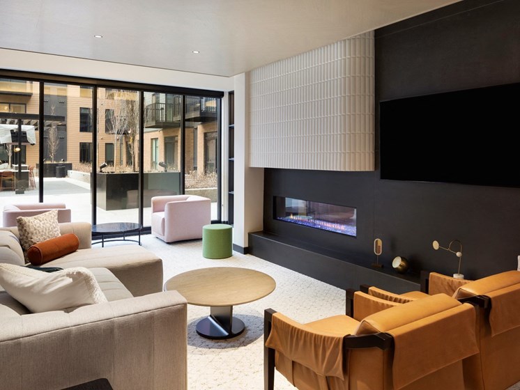 Clubhouse With TV And Fireplace at The Hill Apartments, Saint Paul, MN