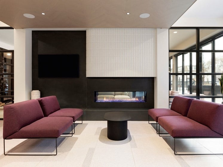 Lounge in Lobby Area with Fireplace at The Hill Apartments in St Paul, MN