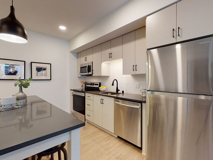 Kitchen With Dining at The Hill Apartments, Saint Paul, Minnesota