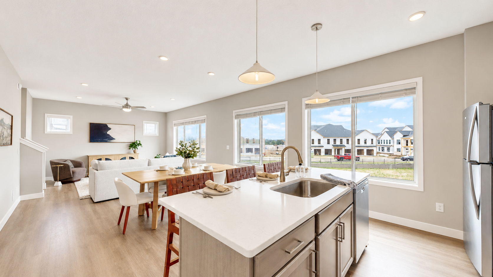 Open-concept kitchen and living area in a Wildwood single family home
