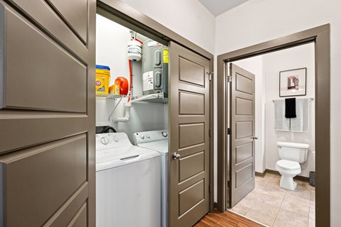 A laundry room with a washer and dryer.