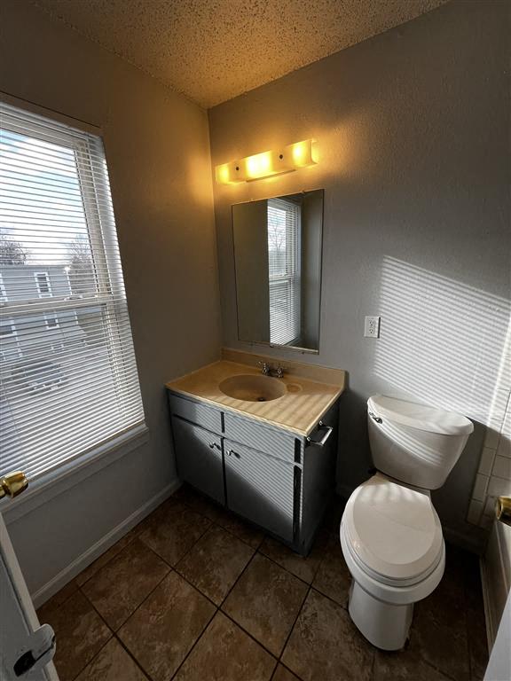 a small bathroom with a toilet and a sink