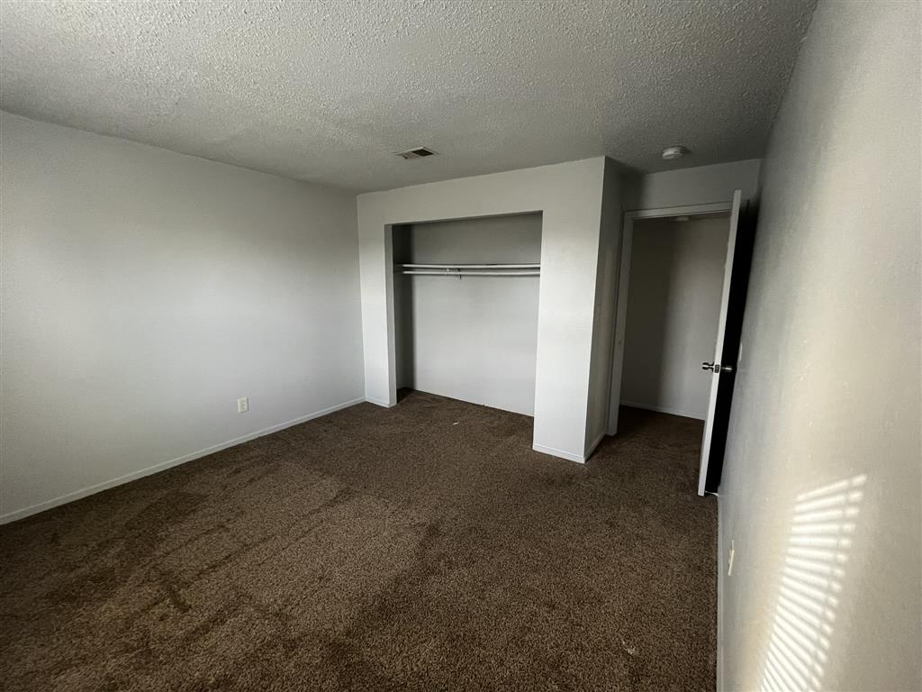 a bedroom with a closet