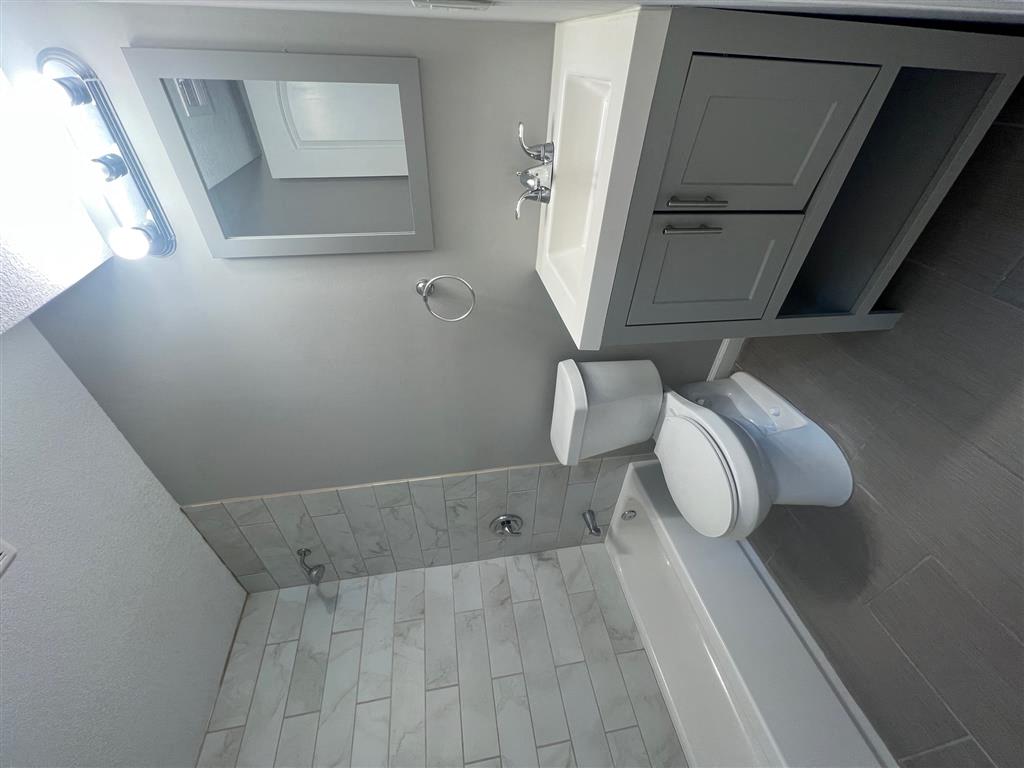 a small bathroom with a toilet and a sink