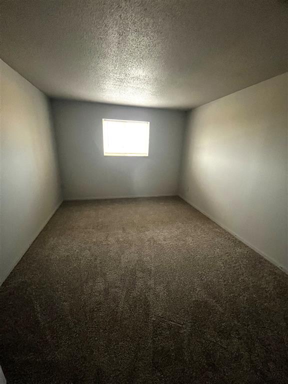 the inside of a small room with a window