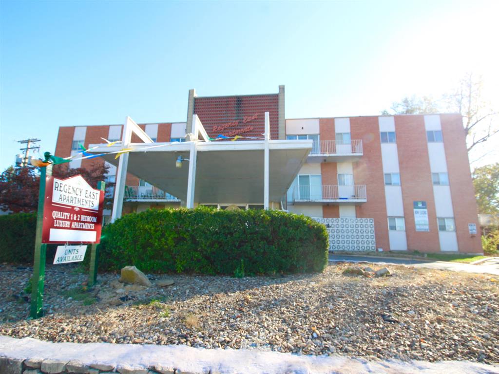 an image of the front of an apartment building