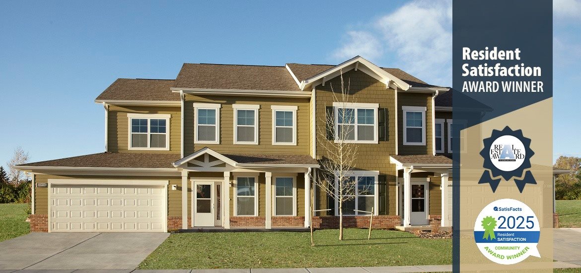 A house with a sign that says Resident Satisfaction Award Winner.