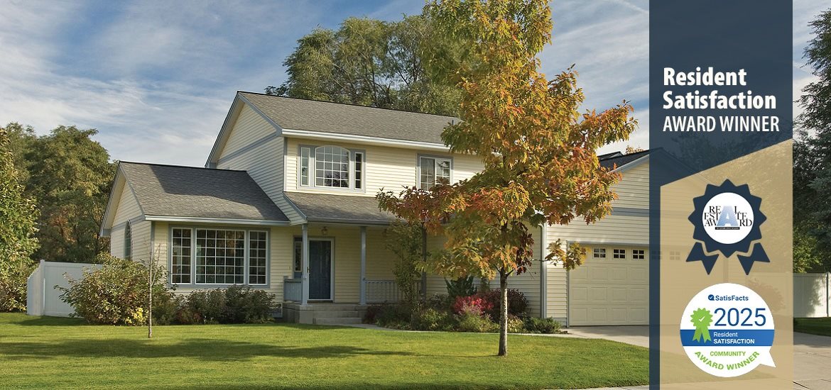 A residential house with a sign that says "Resident Satisfaction Award Winner".