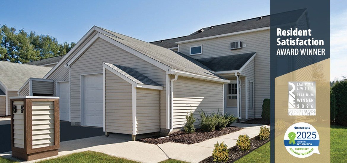 A residential house with a sign indicating it is a resident satisfaction award winner.