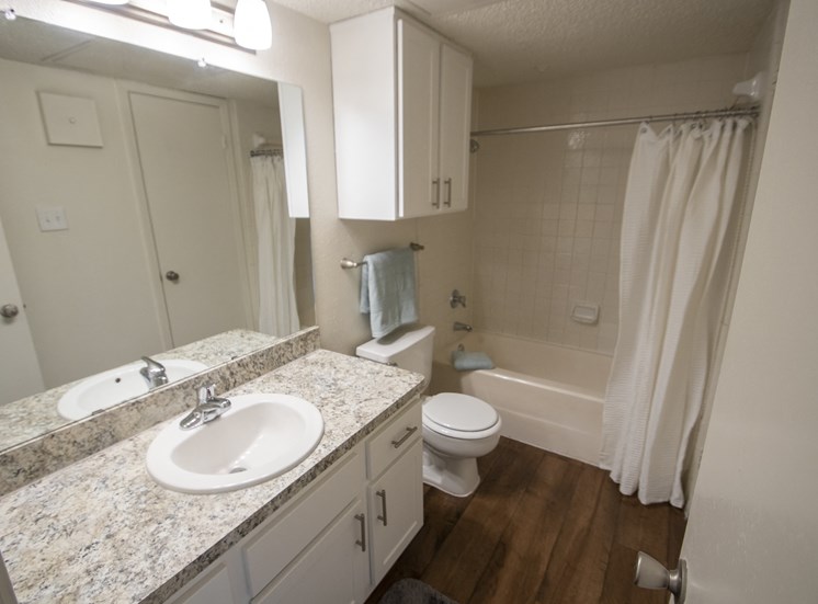 This is a photo of the bathroom in a 704 square foot 1 bedroom apartment at The Boulders Apartments in Garland, TX.