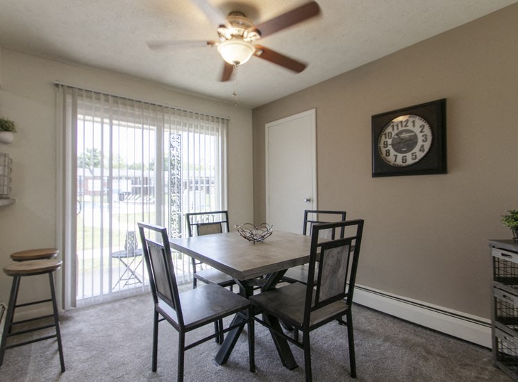 This is a photo of the dining room in the 740 square foot 1 bedroom model apartment at Compton Lake Apartments in Mt. Healthy, OH.
