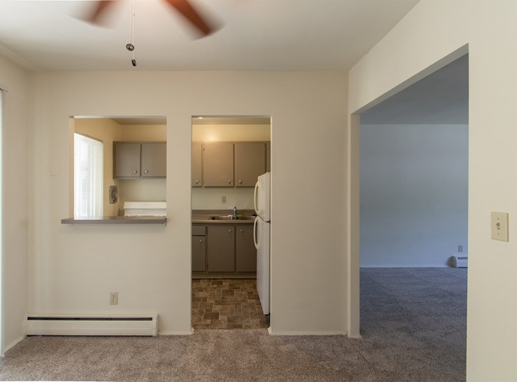 This is a photo looking into the kitchen from the dining room of the 631 square foot, B-style 1 bedroom floor plan at Colonial Ridge Apartments in Cincinnati, OH.