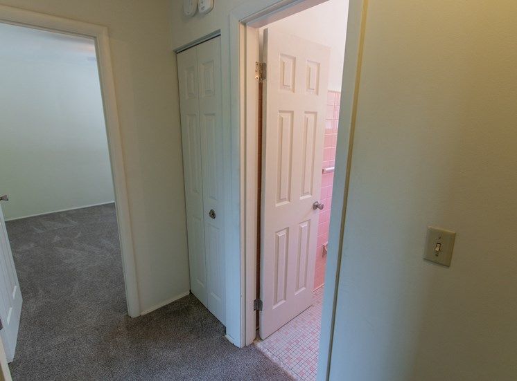 This is a photo of the upstairs hallway in the 1004 square foot, 2 bedroom townhome floor plan at Colonial Ridge Apartments in Cincinnati, OH.