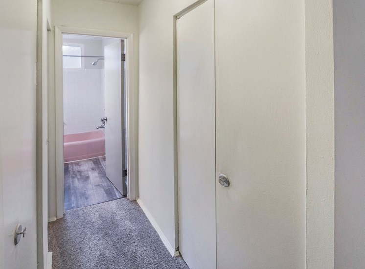 This is a photo of the bedroom hallway closets of the 550 square foot 1 bedroom, 1 bath patio apartment at College Woods Apartments in the North College Hill neighborhood of Cincinnati, OH.