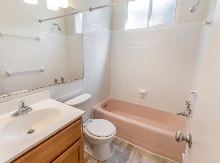 This is a photo of the bathroom of the 550 square foot 1 bedroom, 1 bath patio apartment at College Woods Apartments in the North College Hill neighborhood of Cincinnati, OH.