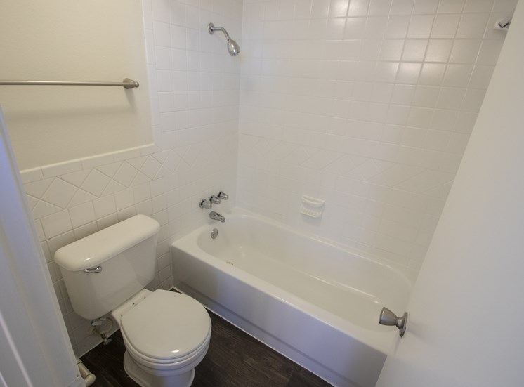 This is a photo of the bathroom in the 500 square foot 1 bedroom apartment at Harvard Square Apartments, in Dallas, TX.