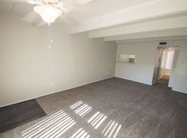 This is a photo of the living room in the 500 square foot 1 bedroom apartment at Harvard Square Apartments, in Dallas, TX.