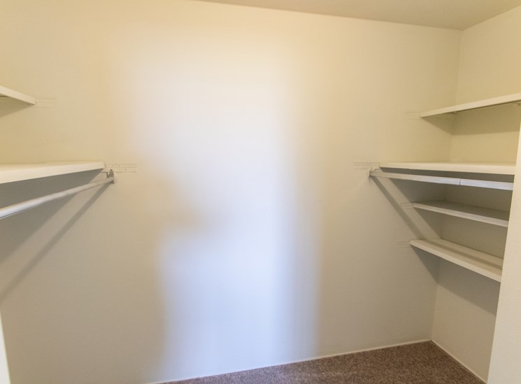 This is a photo of the walk-in closet in the bedroom of the 545 square foot 1 bedroom apartment at Lisa Ridge Apartments in Cincinnati, OH.