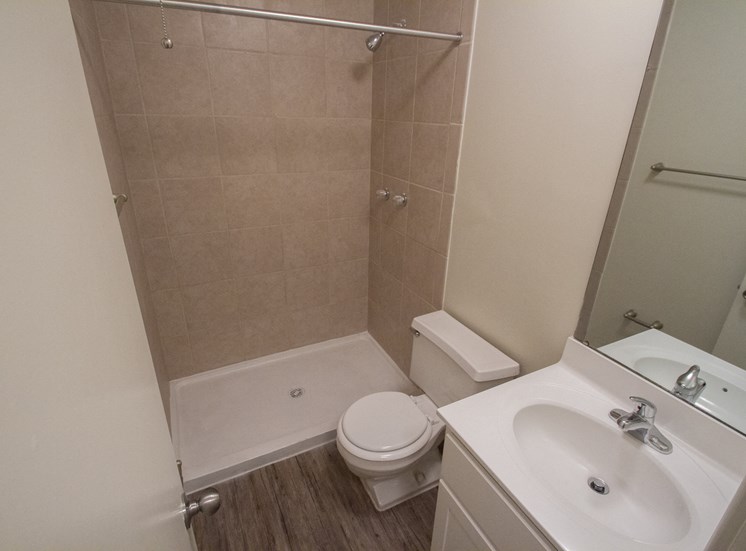 This is a photo of the bathroom with stand up shower in a 849 square foot 2 bedroom, 2 bath apartment at Park Lane Apartments in Cincinnati, OH.