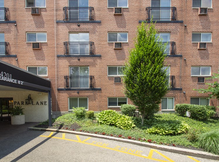 This is a photo of the building exterior showing the entrance to Park Lane Apartments in Cincinnati, OH.