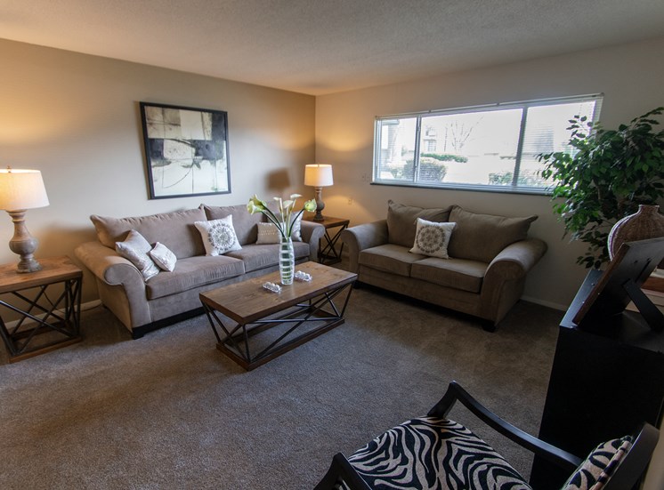 This is a photo of the living room in the  822 square foot, 2 bedroom floor plan at Village East Apartments in Franklin, OH.