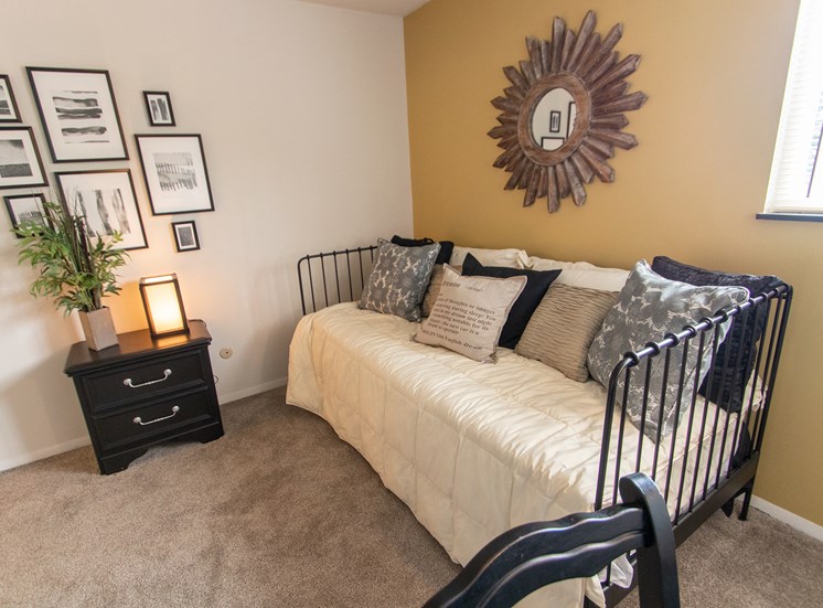 This is a photo of the bedroom in the  822 square foot, 2 bedroom floor plan at Village East Apartments in Franklin, OH.