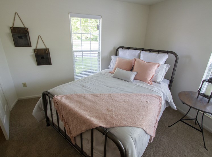 This is a photo of the primary bedroom of the 1100 square foot 2 bedroom Kettering at Washington Park Apartments in Centerville, OH.