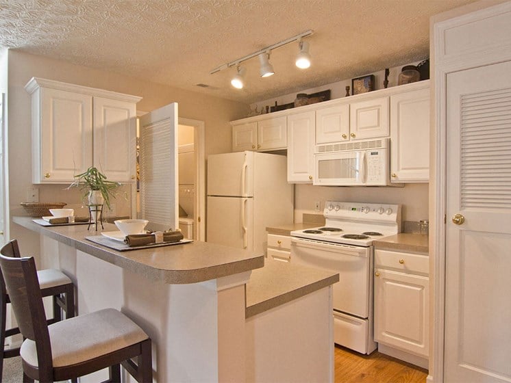 white kitchen in Orleans Apartments and Townhouses for rent