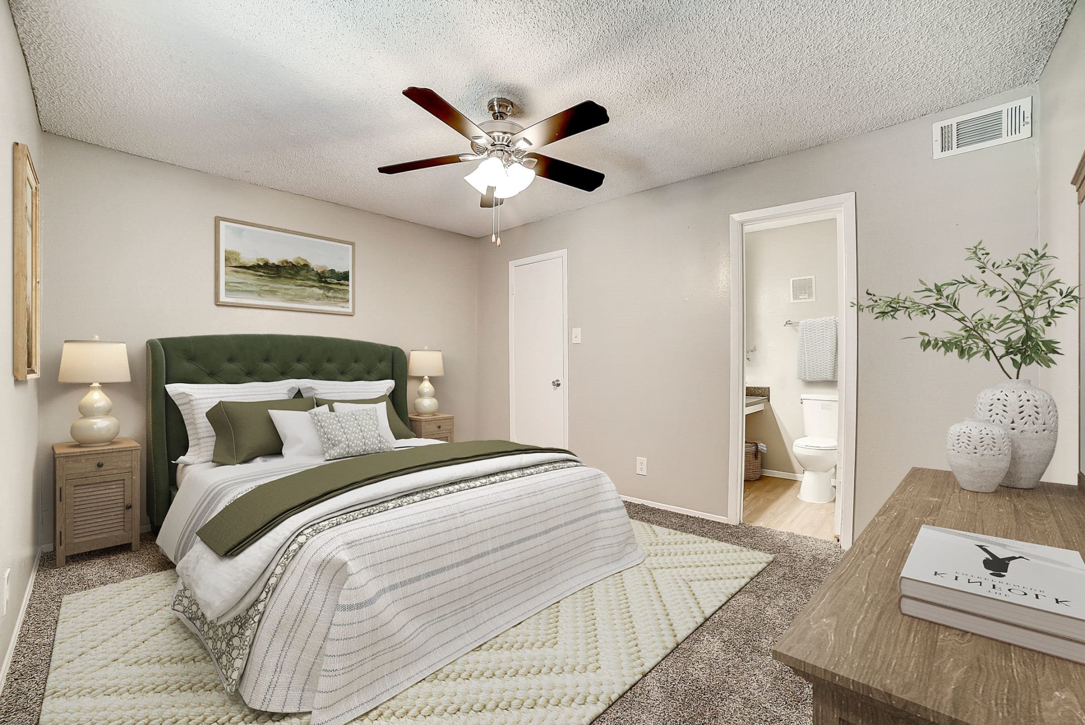 Bedroom with ensuite bathroom at Peaks at Universal City Apartments, Universal City, TX