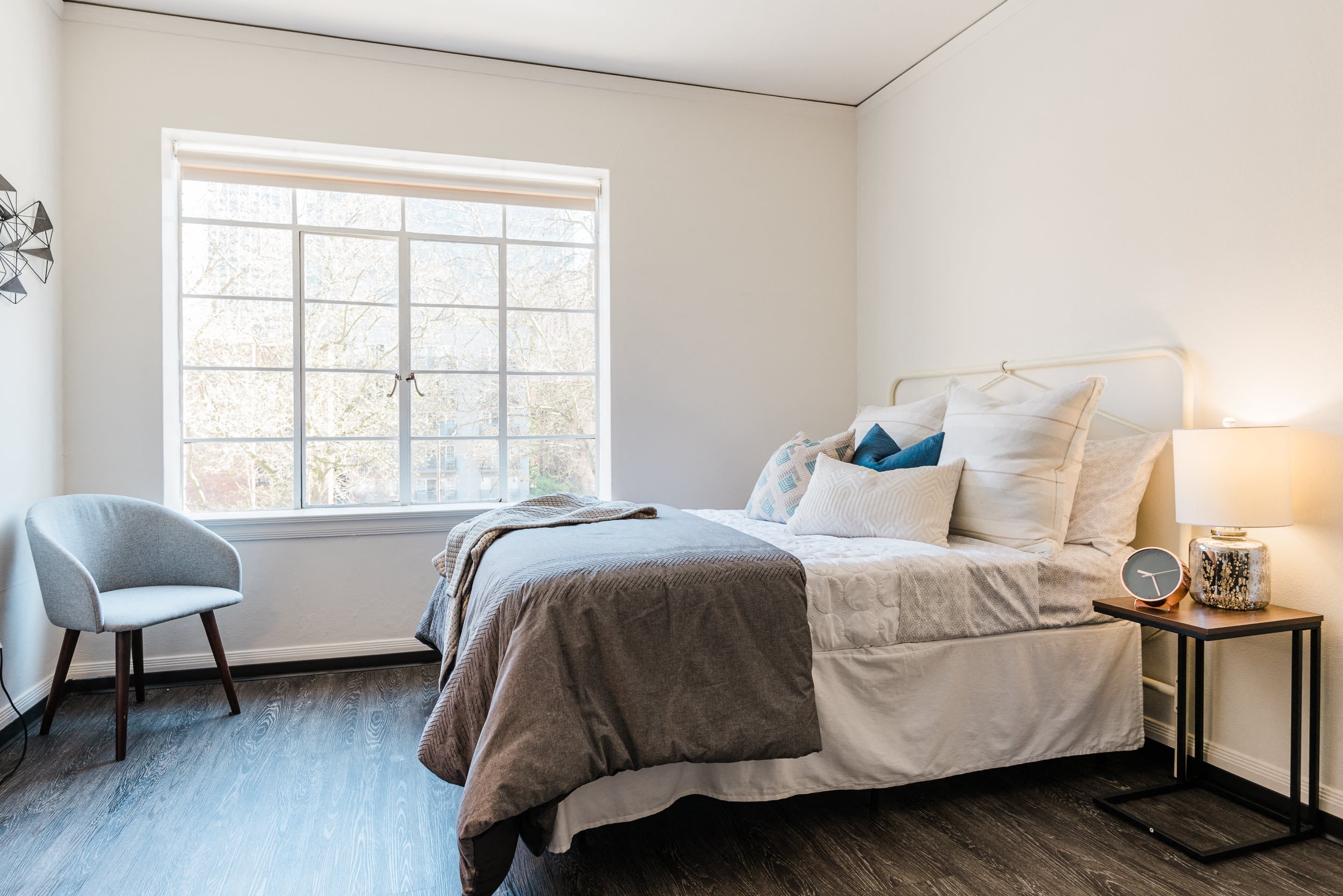 sample studio apartment Roomy sleeping nook accommodates a queen size bed