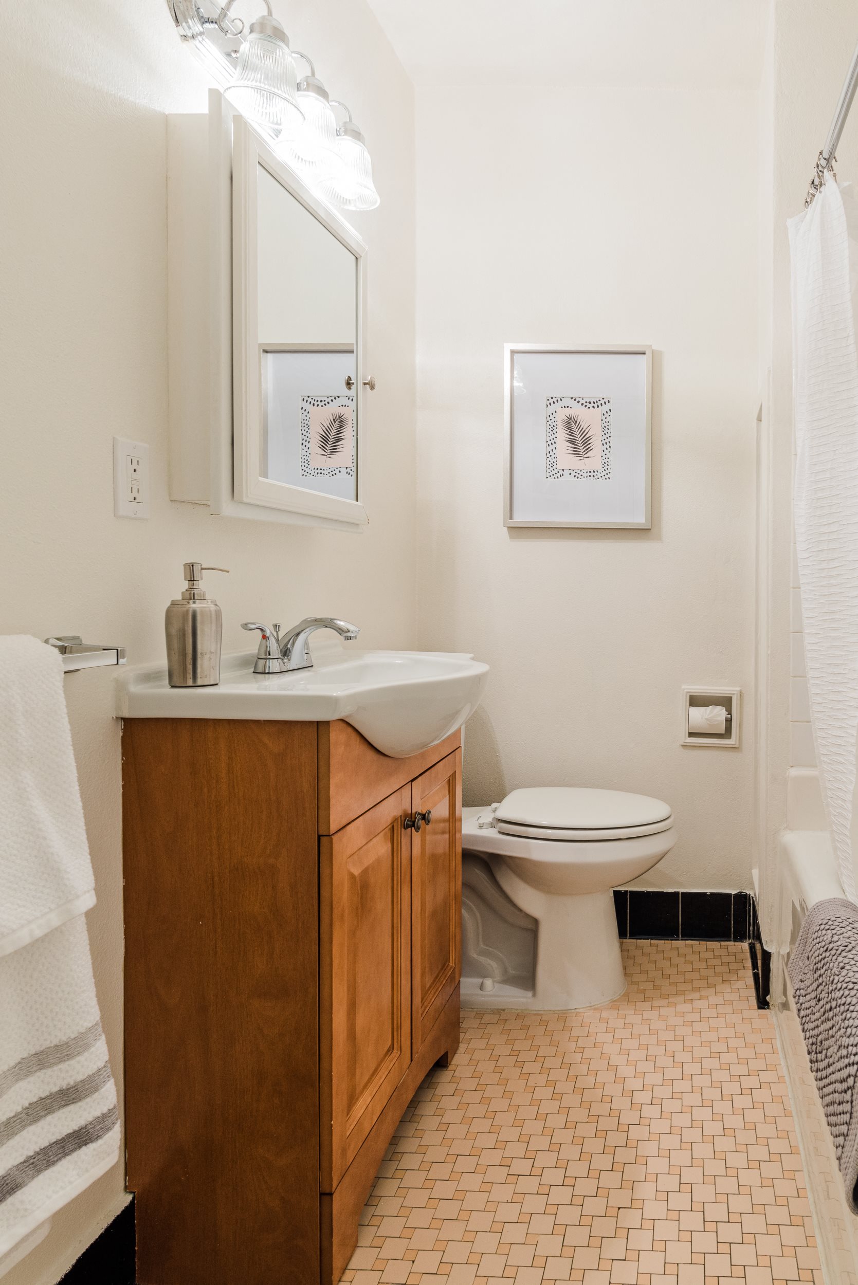 sample studio apartment Full-size bathroom with cute vintage tile