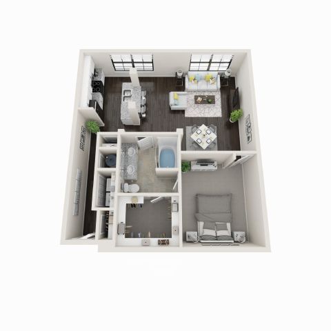 A white model of a house with a kitchen, living room, and bedroom.