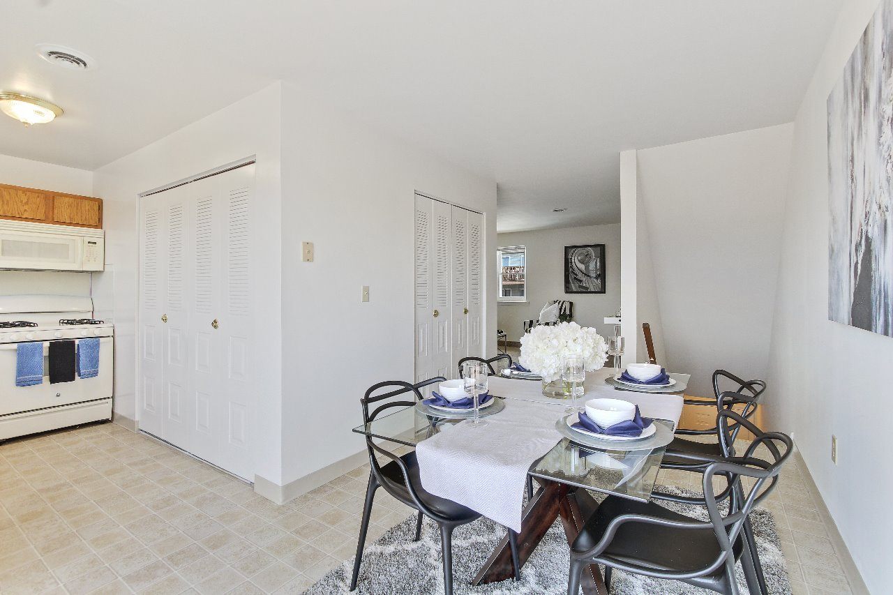 A living room with a white couch
