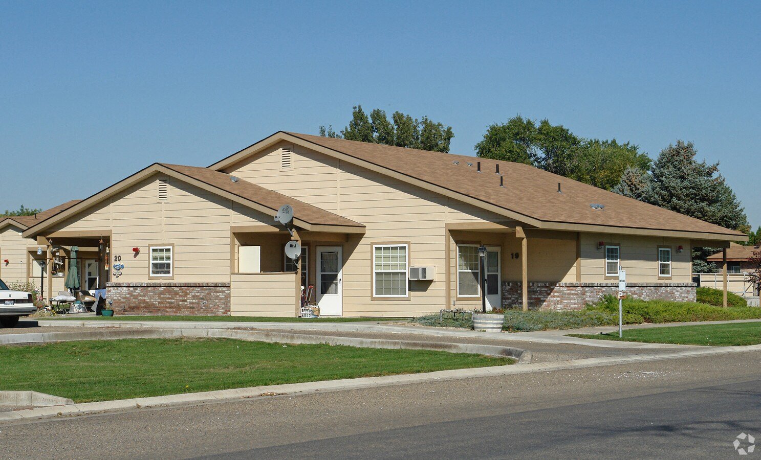 a house with a car parked in front of it