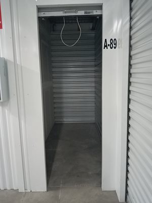 A storage unit with the label A-89 on the door.