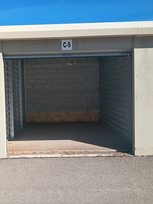 A garage door with a sign that says C-9 on it.